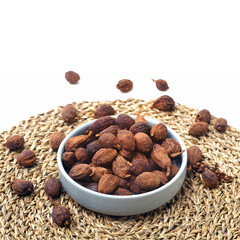 heap of black cardamom whole seeds 