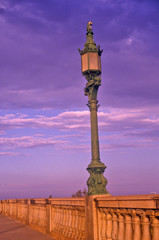 Fototapeta na wymiar Lamps on London Bridge at Lake Havasu, AZ at sunrise