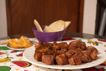 Colombian traditional dish - chorizo ​​and chicharrón