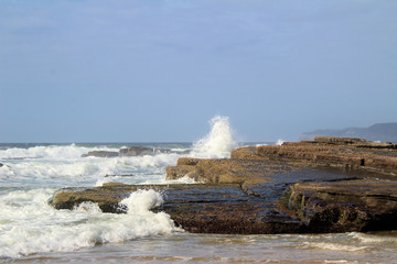 Waves Breaking on Susan Gilmore Beach at Low Tide