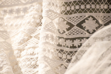 Close up of a wedding dress or bridal gown which is the dress worn by the bride during a wedding ceremony.