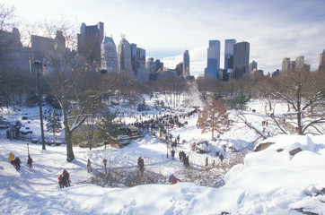 Ice skating Wollman Rink in Central Park, Manhattan, New York City, NY after winter snowstorm