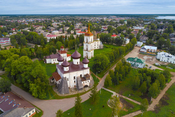Obraz premium View of the temples of Cathedral Square on a cloudy August morning (aerial photography). Kargopol, Russia