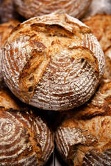 Many loaves of bread stacked