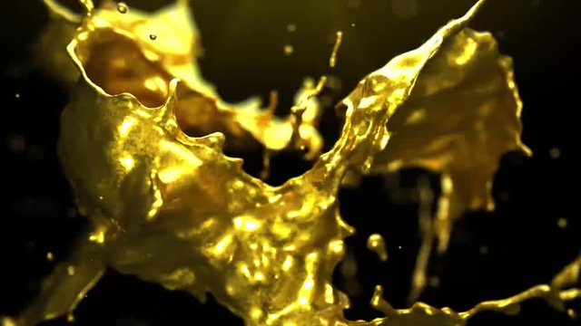 Gemini zodiac sign animated presentation revealed through a a liquid gold explosion