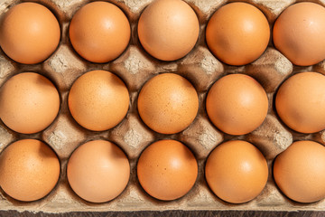 a lot of fresh eggs in a basket
