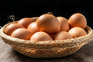 a lot of fresh eggs in a basket