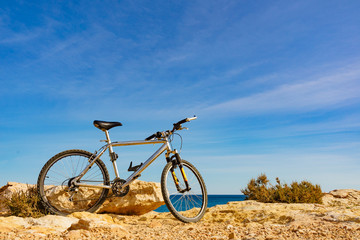 Fototapeta premium Bicycle on beach, active lifestyle.