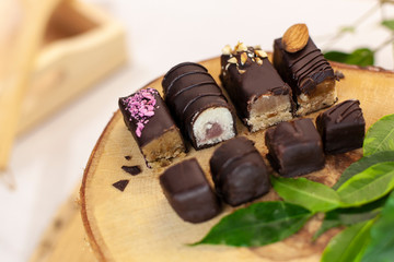 Assortment of handmade sweets. Natural healthy raw chocolate sweets. Sweets for raw foods, vegans, vegetarians and sugar free