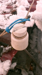 Telegraph insulator on the roof with wire