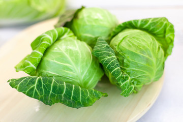 Salad cabbage on the kitchen table, farm vegetables