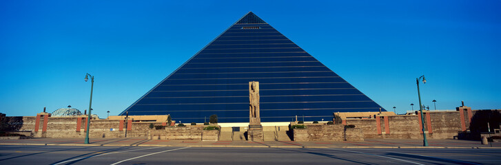 Panoramic view of the Pyramid Sports Arena in Memphis, TN with statue of Ramses at entrance