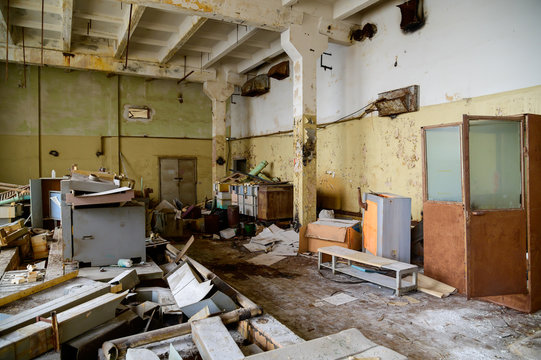 Photo of a garbage dump in a slum building of an abandoned factory