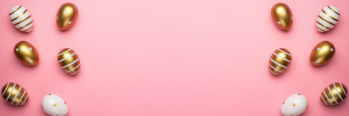 Easter background pink. Easter composition: golden shine decorated eggs in basket. For greeting card, promotion, poster