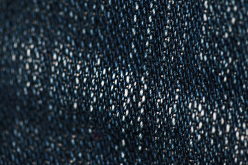 Jeans denim texture close up , focus only one point , soft blured background wallpaper