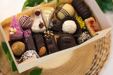 Assortment of handmade sweets. Natural healthy raw chocolate sweets. Sweets for raw foods, vegans, vegetarians and sugar free