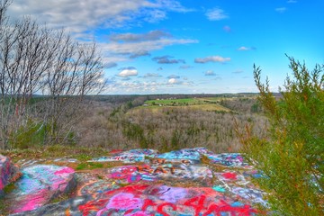 spray painted rocks at Romance Bluffs in Arkansas 2