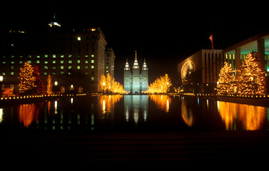Fototapeta na wymiar Historic Temple and Square in Salt Lake City at night, during 2002 Winter Olympics, UT