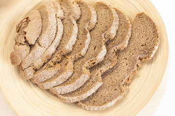 Assortment of bread on the kitchen table on a white isolated background