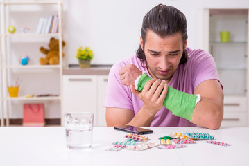 Injured young man at home