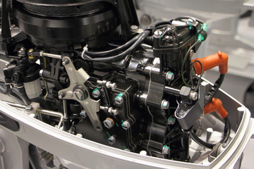 Two stroke outboard boat engine without bonnet close up