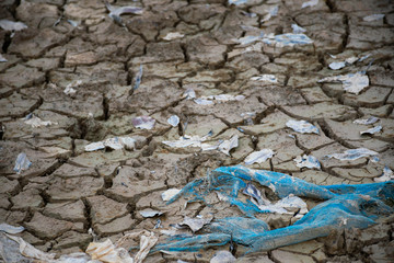 The plastic waste that is left when the water is dry