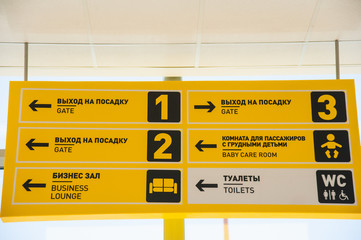 International Airport. Signpost for information and pointer for passenger
