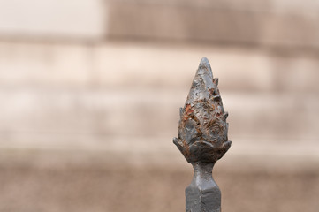 rusty post head in shape of a cone