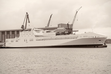 Cargo and passenger ferry in the harbor.