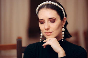 Portrait of an Elegant Woman Wearing Pearl Accessories