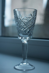 glass of water on blue background retro