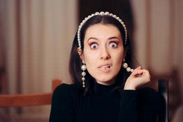 Surprised Girl Making a Funny Face Biting Her Lips