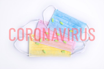 Color antiviral medical masks with pills. Protection against coronavirus. 2019-nCoV virus infection. Novel coronavirus middle east respiratory syndrome. Coronavirus translucent lettering
