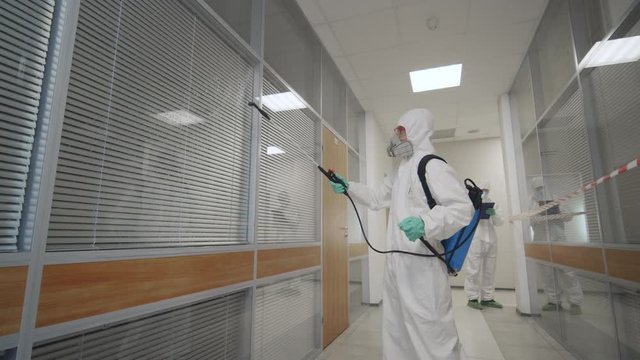 Specialist in hazmat suit cleaning and disinfecting room