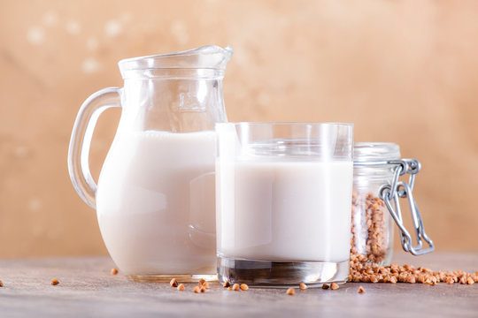 Vegan Buckwheat milk, closeup. Non dairy alternative milk. Healthy vegetarian food and drink concept. Copy space