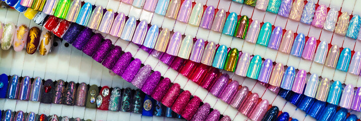 A collection of cosmetics for nail polishes in a shopping center.	