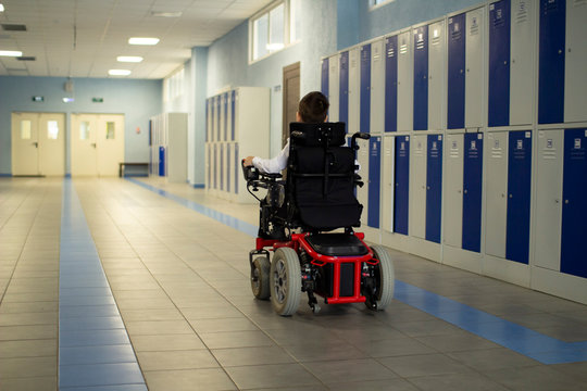 A disabled student in a wheelchair in primary school.