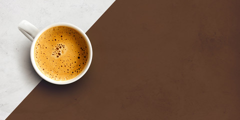 cup of coffee on cement table background