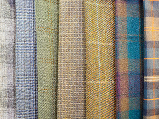 A large selection of bright plaid fabrics in the fabric store. Close-up of cellular tissue samples. Large collection of beautiful fabrics at the factory or in the store