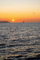 Sailing boats on a background of a beautiful sunset
