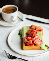 Beautiful and healthy breakfast - wafer with tomatoes and coffee