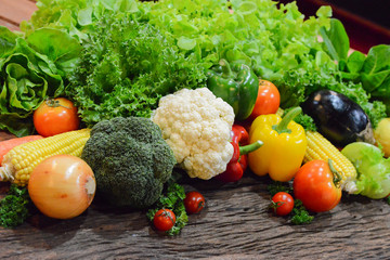 Mixed Vegetables and Salads on wooden Background.Select focus on cauliflower.