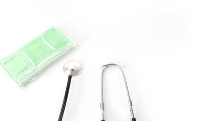  Surgical mask protective mask with CORONAVIRUS and  stethoscope on white background,healthy  of Covid 19 virus concept
