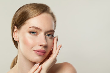 Fototapeta premium Elegant perfect model woman with clear skin on white