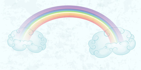 Rainbow and clouds over pastel blue sky background