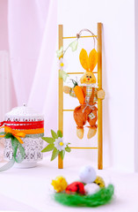 little chicken on a background of orange Bunny and eggs