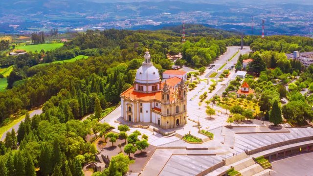 Braga, Portugal. Aerial view of Sameiro Sanctuary in Braga, Portugal during the sunny day. Panning time-lapse of popular landark with nature around it