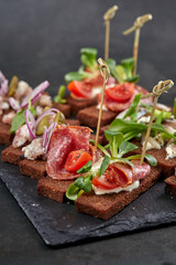 canape with meat  and vegetables