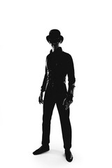 Steampunk actor in glasses and hat posing.