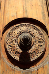Volterra (SI), Italy - April 25, 2017: An old door sculpture in Volterra town, Tuscany, Italy